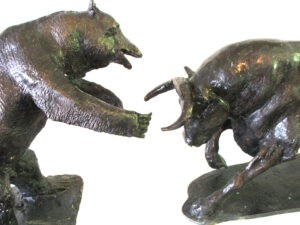 Two bronze sculptures of Bear and Bull, created by the artist and master sculptor Robert C Hitchcock. Bronze Sculpture by Artist and Master Sculptor Robert C Hitchcock