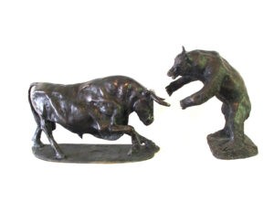 A pair of bronze sculptures of the Bear and Bull, created by Master Sculptor Robert C Hitchcock. Bronze Sculpture by Artist and Master Sculptor Robert C Hitchcock