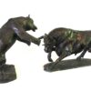 A pair of bronze sculptures, the Bear and Bull by Master Sculptor Robert C Hitchcock, depicting a bear and a bull. Bronze Sculpture by Artist and Master Sculptor Robert C Hitchcock