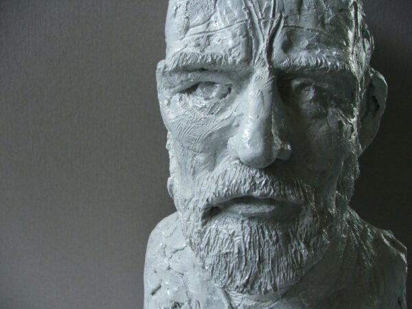 A bronze sculpture of a man with a beard, created by artist Robert C Hitchcock, called the Vincent Bust. Bronze Sculpture by Artist and Master Sculptor Robert C Hitchcock