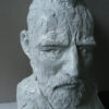 A Vincent Bust, created by Master Sculptor Robert C Hitchcock, portrays a white bust of a man with a beard. Bronze Sculpture by Artist and Master Sculptor Robert C Hitchcock