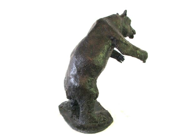 A Bear Sculpture standing on its hind legs, created by master sculptor Robert C Hitchcock. Bronze Sculpture by Artist and Master Sculptor Robert C Hitchcock