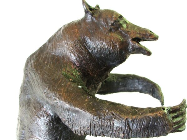 A bronze Bear Sculpture created by Master Sculptor Robert C Hitchcock. Bronze Sculpture by Artist and Master Sculptor Robert C Hitchcock