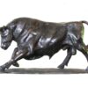 A Bull Sculpture of a bull running on a white background created by Master Sculptor Robert C Hitchcock. Bronze Sculpture by Artist and Master Sculptor Robert C Hitchcock