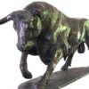 A Bull Sculpture of a bull running on a white background created by Master Sculptor Robert C Hitchcock. Bronze Sculpture by Artist and Master Sculptor Robert C Hitchcock