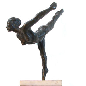 A bronze sculpture of a Ballet Dancer on a marble base.