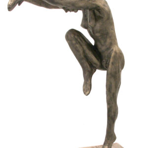 A bronze statue of a woman in a pose.