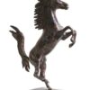 A bronze sculpture on white background of a Tribute to The Ferrari Horse, created by artist and master sculptor Robert C Hitchcock.